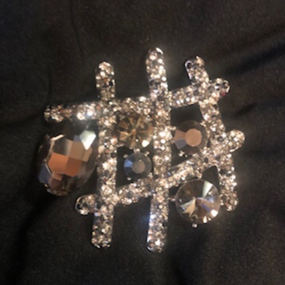 Tic tack toe brooch in silver and black crystal